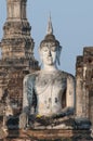 Giant Buddha at Wat Mahathat in Sukhothai, Thailand.